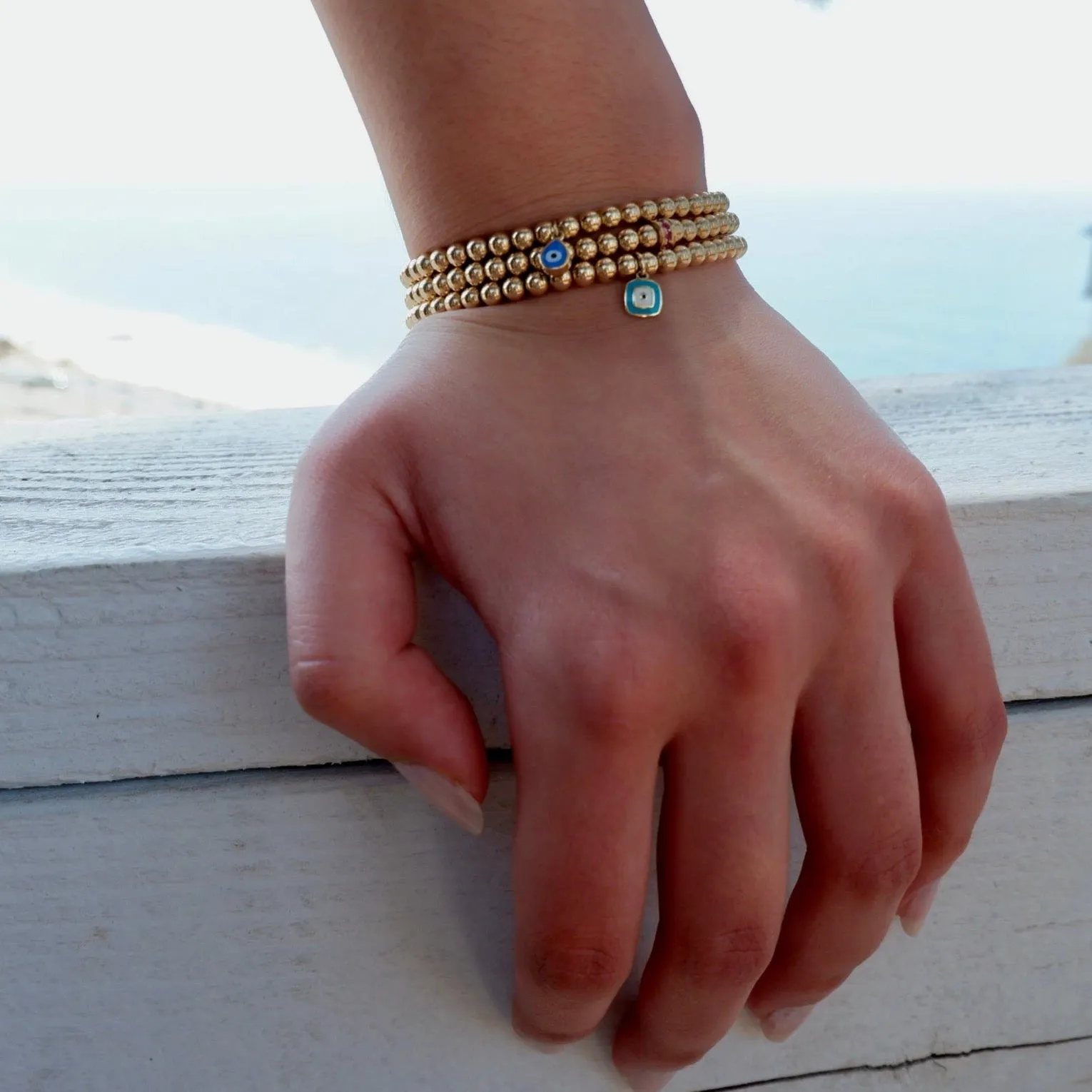 14k gold evil eye charm bracelets