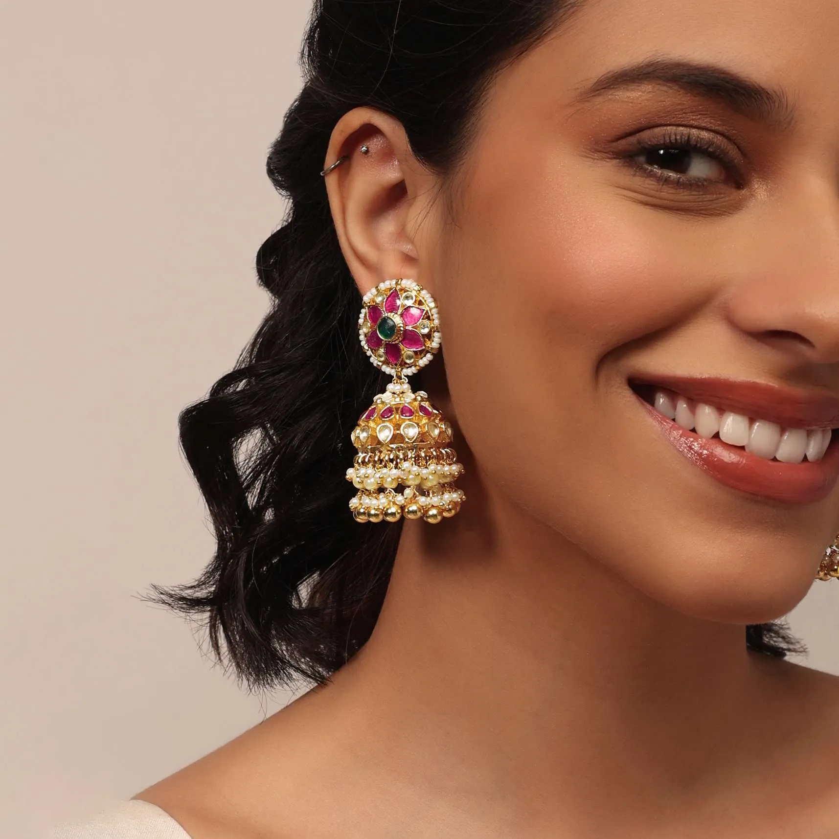 Gold Finish Kundan Earrings With Synthetic Stones And Beads